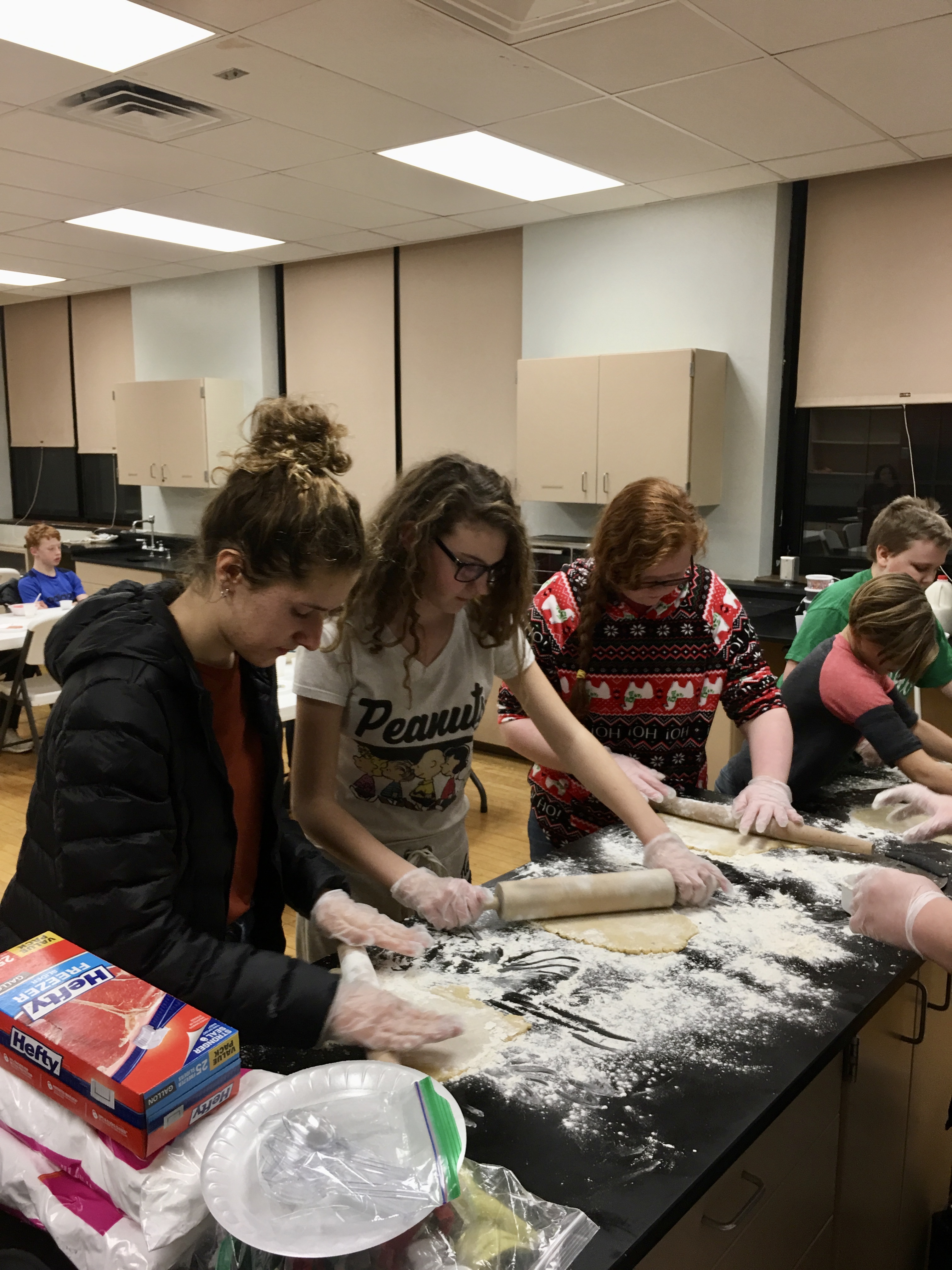 Teens in the United Way’s after school program learn to cook as part of a teaching series with Chef Michael Turner from Olivina.